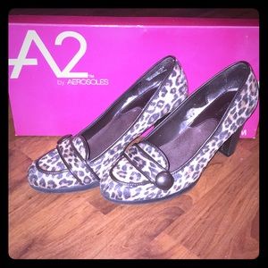 Pair of leopard heeled loafers.